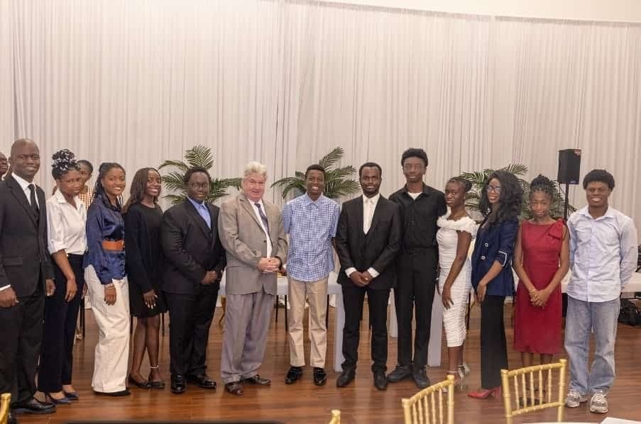 Senator Michael Brady with the young published authors, leaders, and entrepreneurs.