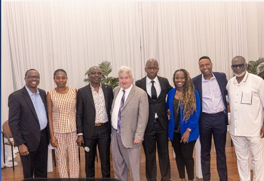 Senator Michael Brady with Charles Awodu and guests.